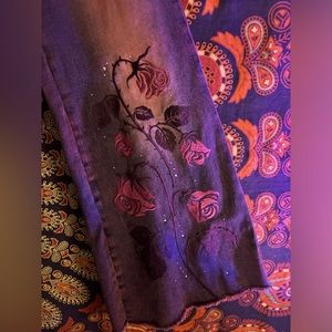 Dolls Kill medium wash straight leg rhinestone jeans for women